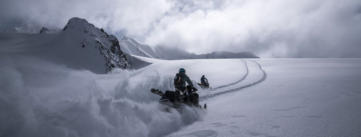 cfr racing snowmobiling in the winter mountains